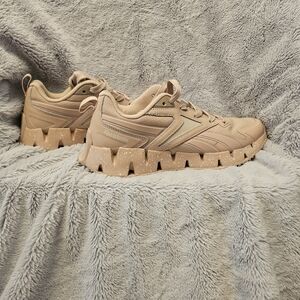 Reebok Womens Galaxy 1 Sneaker. I would say the color is blush. NWOT